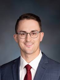 Who are these happy campers, excited to have moved from MN to WI? Jeff  Swick, MD '13 and Marki (Klapperich) Swick, MD '18! 🦡 Dr. Marki Swick is a  dermatologist with Affiliated