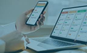 A storefront with various promotional banners and signs in multiple languages advertising ticket exchange services. The counter displays numerous tickets and small items, while the walls are covered with colorful posters and price listings.