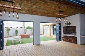 Cozy Covered Verandah Patio Enclosed With Funky Lighting Interior Design 5 On Dagbreek Langebaan Covered Patio Design Patio Flooring Built In Braai
