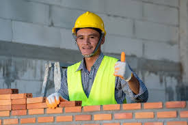 Possibilité d'obtenir une maturité professionnelle pendant l'apprentissage ou. Ouvrier Industriel De Macon L Installation De Maconnerie En Brique Sur Le Mur Exterieur A La Nouvelle Maison Photo Premium