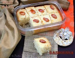Heat the remaining ghee in a heavy bottomed wok, put in the semolina. Basboussa Semolina Cake From West Bank Ribbons To Pastas