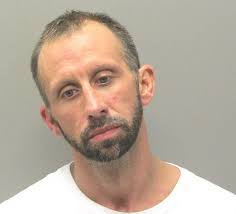 Felon allegedly found with gun, body armor