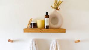 This stylish shelf is the contemporary answer for your bathroom storage needs. 17 Small Bathroom Shelf Ideas