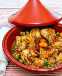 Tagine Of Cornish Hens With Saffron Preserved Lemon Olives And Dried Apricot Tagine Recipes Tagine Cooking Tagine