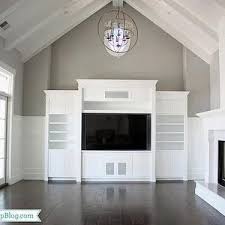If I Go With White For The Vaulted Ceiling Texture Is Critical Beadboard Built In Entertainment Center Vaulted Ceiling Living Room Transitional Living Rooms