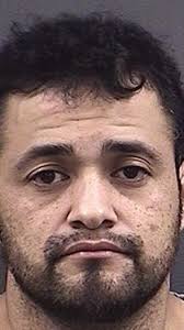 Police: Man arrested after seen breaking into vehicle