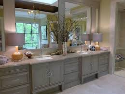 Elegant bathroom with blue freestanding vanity and golden accent handles. Luxury Bathroom Bathroom Vanity Decor Small Bathroom Vanities Bathroom Cabinets Designs