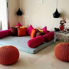 A bunch of floor cushions are ideal if you want to create a cozy nook for the area under the staircase, for a corner in your living room, the area in front of the window or anywhere else. Love This Idea Of Taking Traditional Floor Seating And Creating So Much Colour And Vibrancy To It Tama Indian Home Decor Home Decor Floor Cushions Living Room