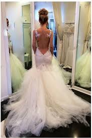A lace sheath wedding dress with a halter neckline, a low back is ideal for a modern yet romantic bride. Illusion Back Mermaid Wedding Dresses With Lace Bodice Loveangeldress