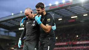 Alisson becker embraces a young supporter who had run on to the pitch during the international friendly game between liverpool and napoli at aviva. Liverpool S Alisson Sidelined For 4 6 Weeks As Com