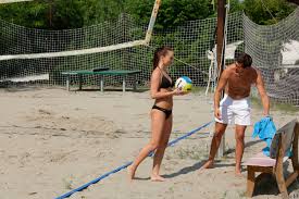 Lana Belle fucks her boyfriend after a game of beach volleyball