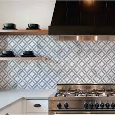 Talavera tiles arranged in a graphic chevron pattern and glossy ebony cabinetry (black, fine paints of europe) liven up the classic monochromatic look in this san antonio kitchen by todd romano. The Best Kitchen Ideas In 2021 Interior Home And Design