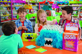 Cover A Box With Feathers For A Monster Base Paint A Few Lollipop Stick Ends And Insert Into The Prop And Then Scholastic Book Fair Book Fair Scholastic Book