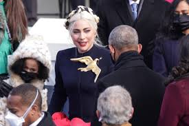 «i am deeply honored to be joining @bideninaugural on january 20 to sing the national anthem and…» Behold Lady Gaga S Custom Schiaparelli Golden Inauguration Dove Fashionista