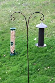 Upside down finch feeder is a tall tube feeder with 6 seeds ports that encourages birds to feed in a natural upside down position. Birds Backwoods Maple