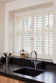 On that note, here's a little inspiration:just think: 33 Stylish Kitchen Window Blinds Ideas Kitchen Shutters Indoor Shutters Kitchen Window Blinds