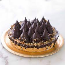 Esta torta es ideal para chocohlicos perezosos, pues se prepara en un periquete. Tarta De Conitos De Dulce De Leche Banada En Chocolate Las Lomas