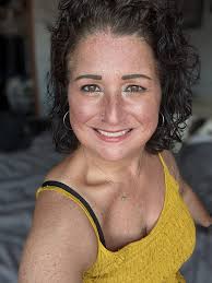 New group member sharing eye photo in sunlight