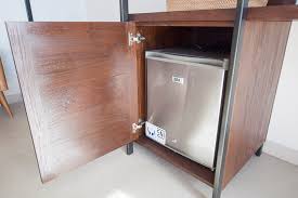A wine bar can store your wine bottles, glasses, and drinking accessories while giving you a place to open a bottle and pour a glass of wine. 10 Ke Rensia Private Pool Villas Gili Air Studio Bedroom Mini Bar Fridge Kerensiavillas