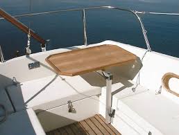 Lagun Table Arm Installed Jpg 591 447 Pixels Cockpit Boat Interior Sailboat Interior
