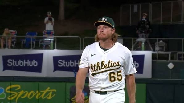Willie MacIver pitches a scoreless inning