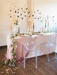 You can even hang them from the ceiling with clear string or wire. 23 Butterfly Wedding Ideas To Make Your Heart Flutter Ruffled