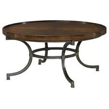 Try a wider, oval shape for sectionals, or keep things cozy by pairing a loveseat with a round coffee table. Fusion Round Cocktail Table Transitional Coffee Tables By Bassett Mirror Co Houzz