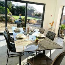Approx 3 years old some scratches to the table and markings to the brushed steel as seen on photos due to usual wear and tear. Dwell On Twitter Such A Beautiful Dining Space With A Great View Wouldn T You Agree Teno Ceramic Marble Extending 6 8 Seater Dining Table Grey Was 899 Now 799 Https T Co 57dz5cjcyg