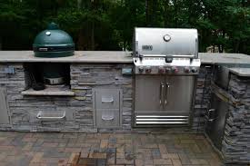 On this custom outdoor kitchen we used a beautiful upgraded wild sea green granite paired with a silver travertine stacked stone facade. Outdoor Kitchen With Green Egg Houzz