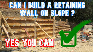 Retaining walls can beryllium constructed with various materials from stone to wood. Can I Build A Retaining Wall On A Slope All Access 510 701 4400 Youtube
