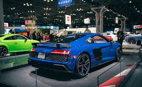 At the rear of the vehicle, the dominant diffuser frames the sport exhaust with black oval tailpipes. 2020 Audi R8 Exterior Tweaks And Extra Power For A Nominal Price Jump