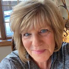 Hi everyone I have a 11 week old doodle and would love some tips for night  time potty and crate. She doesn't like her crate and will park and whine  all through