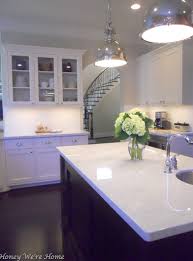 Agreeable gray kitchen white cabinets. White Carrera Marble Countertop Transitional Kitchen Sherwin Williams Agreeable Gray Honey We Re Home