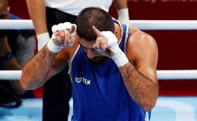 A french super heavyweight boxer sat on the olympic ring apron in protest for about an hour after he was disqualified from his quarterfinal bout because of an intentional head butt. Idxh1m96 L7fxm