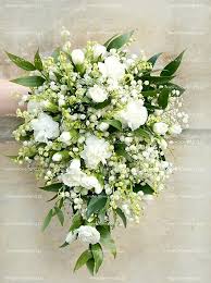 Stunning Teardrop Cascading Wedding Bouquet Arranged With White Lily Of The Valley W Cascading Wedding Bouquets Flower Bouquet Wedding White Wedding Bouquets
