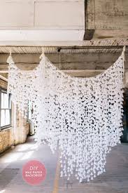 These tissue paper flowers are affordable and popular as reception decorations. 50 Affordable Chic Wedding Decor Ideas From The Dollar Store