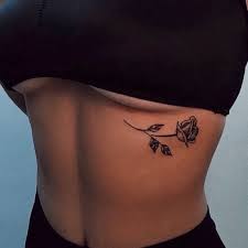 Small sweet rose on shoulder back. Black Rose Tattoo Tattoo Designs For Women