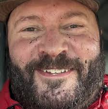 Who to call to clear stuck vehicles at Sunset Beach?