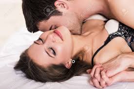 Close Up Portrait Of Young Romantic Couple Hugging And Kissing On A White  Bed, Having Sex And Being Loving With Each Other. Stock Photo, Picture and  Royalty Free Image. Image 51512212.