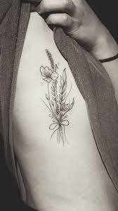Pin By Kaitlin Gustafson On Tattoo Idea Wildflower Tattoo Tattoos Piercing Tattoo