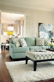 A light blue ceiling mimics the daytime sky, creating a vast feeling of space. Light Blue Living Room Ideas Of How To Make A Blue Green Acnn Decor