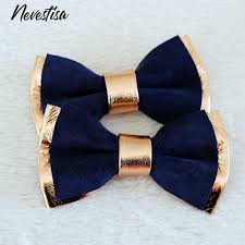 Some color pairings showcase classic wedding day elegance, like royal blue and gold. Rose Gold Bow Ties