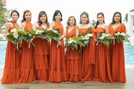 A Vibrant Tropical Themed Wedding In Boracay With Splashes Of Orange Orange Bridesmaid Dresses Tropical Wedding Theme Tropical Wedding Dresses