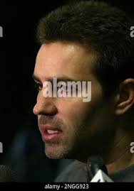 St. Louis Rams quarterback Kurt Warner collects a kiss from his wife,  Brenda, after the Rams defeated the Tennessee Titans 23-16 in Super Bowl  XXXIV in Atlanta, Sunday, Jan. 30, 2000. (AP