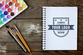 Logo On Notebook Mockup Mediamodifier Online Mockup Generator Logo Mockup Online Logo Mockup