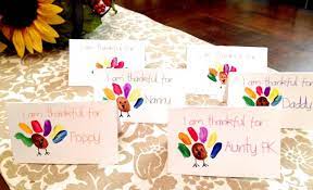Get my free holiday place card designs (design #165) from my free resource library (get the password to the library in the form at the bottom of this post). Thanksgiving Place Cards That Kids Can Make Free Printable Thanksgiving Place Cards Thanksgiving Place Cards Kids Thanksgiving Name Cards