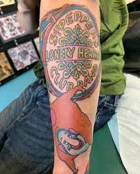 His second design used more modern lettering and was attached to the other. Mammoth Tattoo Sgt Pepper S Lonely Hearts Club Band Facebook