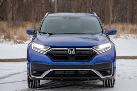 Touring shown with gray leather. Honda Cr V Which Should You Buy 2020 Or 2021 News Cars Com