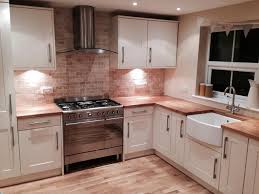 We designed the solid oak handrail on all the cabinetry to bring warmth to the dark gray and steel scheme, powell says. Customer Kitchen Wooden Worktop Gallery Page 4 Worktop Express