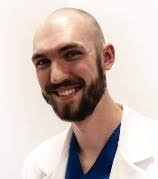 Early physiotherapy and chest wall oscillation in patients with COVID-19  disease at the intensive care unit: a pilot clinical tr